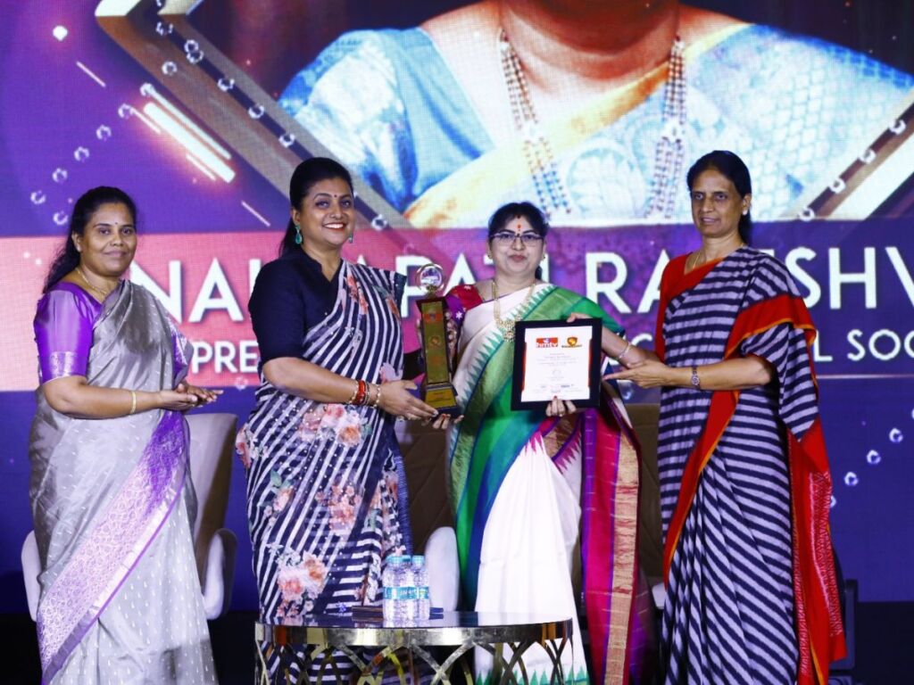 Nallapati Rajeshwari President of Delhi World Schools Receives hmtv Naari Puraskar from Telangana Education Minister Sabitha Indra Reddy